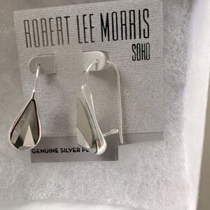 NWT silver earings. Received as gift but never used.